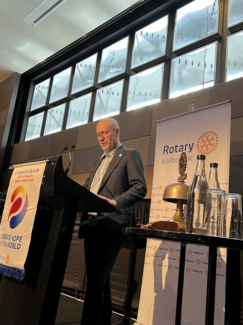 CSIRO Chief Executive Dr Doug Hilton stands at a lectern delivering a speech