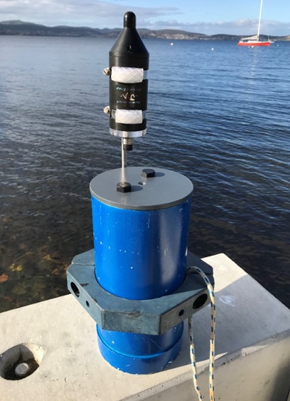 Hydrophone with water in the background