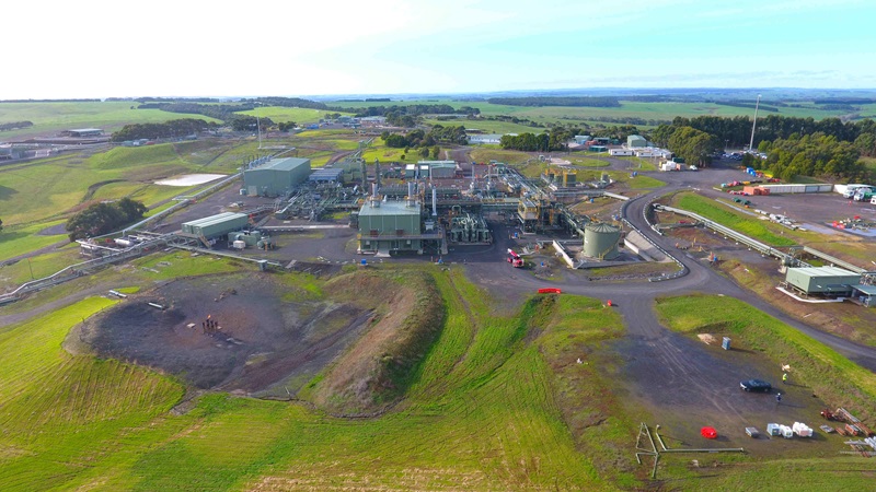Aerial view of an industrial facility surrounded by farmland