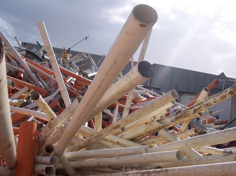 PVC tubes in a pile of rubbish