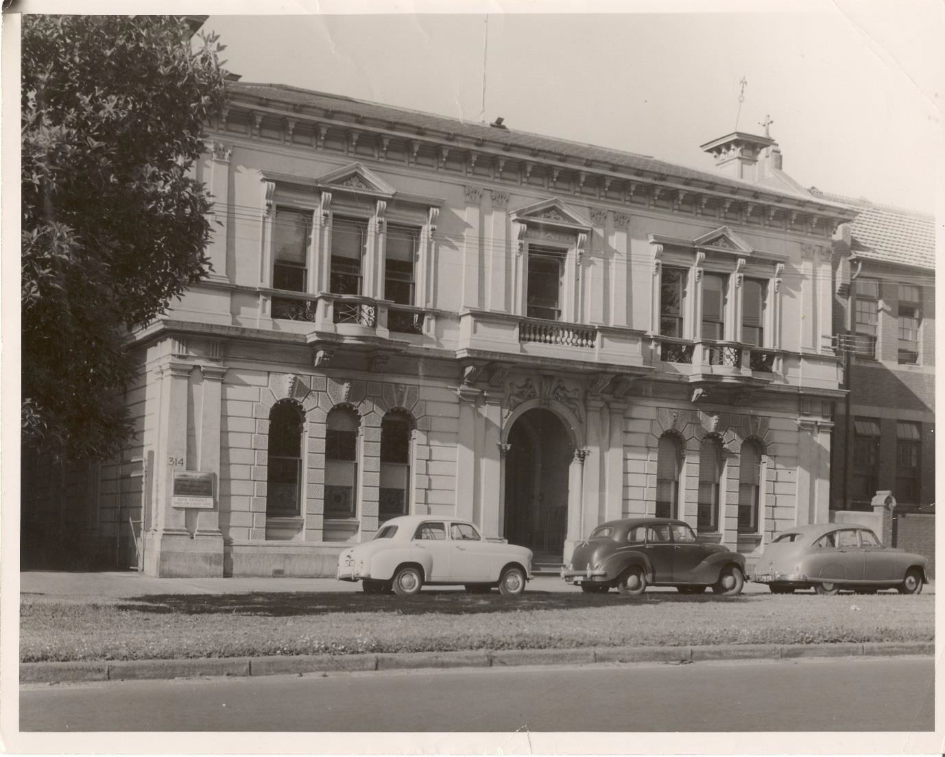 A black and white photo of the outside of CSIR's former building at 314 Albert Street, East Melbourne.