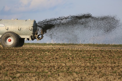 Fertiliser being applied to a field.