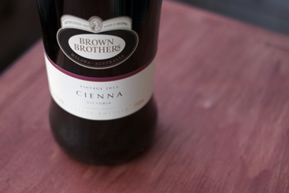 medium close shot of wine bottle with label - Brown Brothers, Cienna