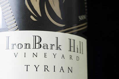 close shot of label on wine bottle - text reads: Ironbark Hill Vineyard, Tyrian.