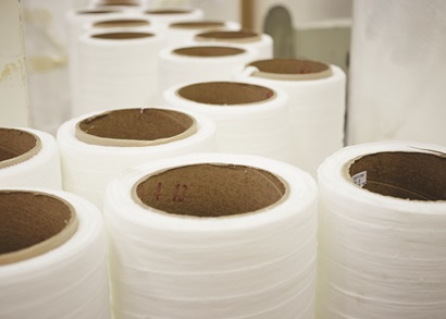 Rolls of moisture-trapping fabric at Textor Technologies.