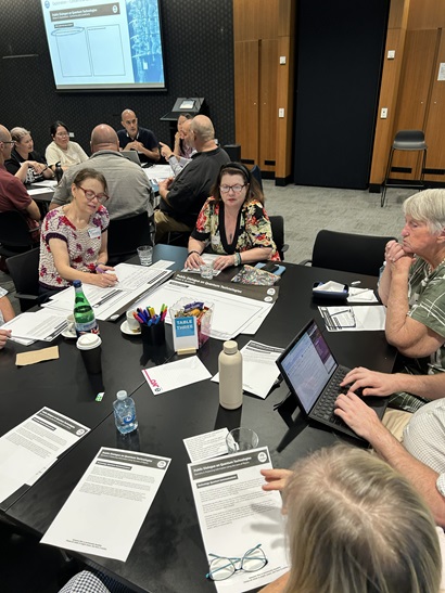 Group of people working together at a table