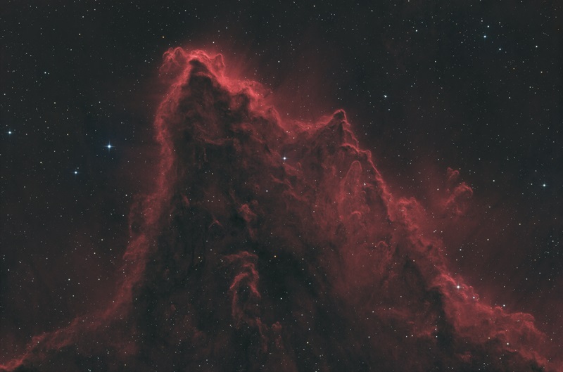 Red gasses shaped like a mountain