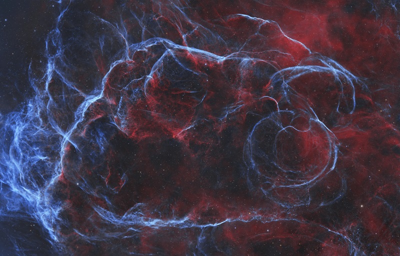 Swirls of blue and red gas