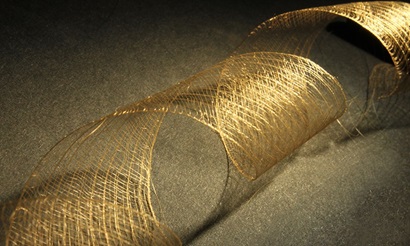Image of gold silk in a spiral formation