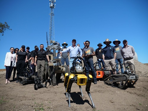 Team members from EPE and CSIRO's Data61 with robots. 