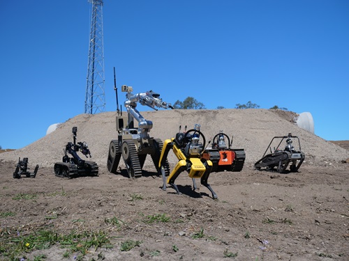 Five tracked and one quadruped robot.