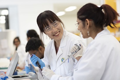 Two people in lab coats