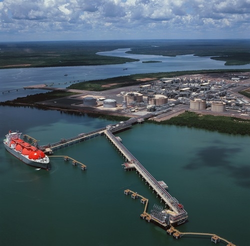 An aerial picture of Darwin's Middle Arm Peninsular - ocean and a big boat (Liquified Natural Gas infrastructure)