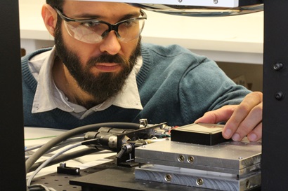 A CSIRO researcher studies perovskite solar cell technology