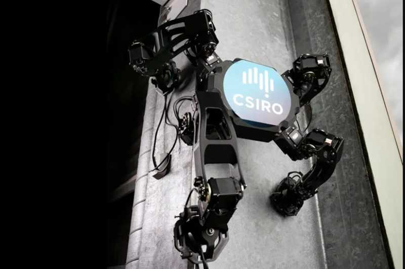 robot like machine climbing up a wall 