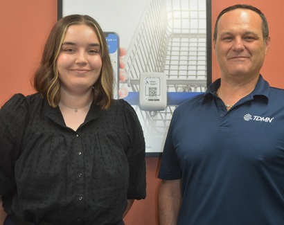 Intern Emma Kaelin standing next to TDMN founder Domenic Ammendolia