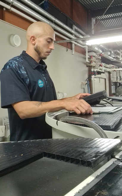 Graduate student Isaak Kadel at his work station.