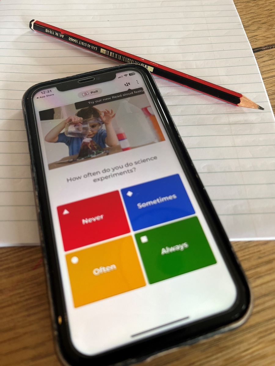a phone on a table showing the Kahoot! app quiz screen