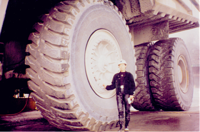 Helen’ standing next to a 280 tonne caterpillar truck