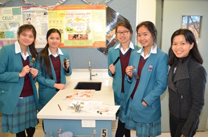Edith Chow shares her science knowledge with some students as part of STEM Professionals in Schools