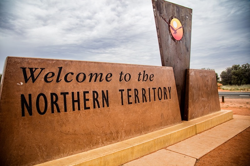 Outback, Australia - November 12, 2022: Northern Territory sign at the border to South Australia. Image by Shutterstock.