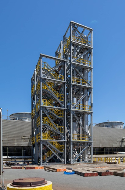 Building with scaffolding under a blue sky