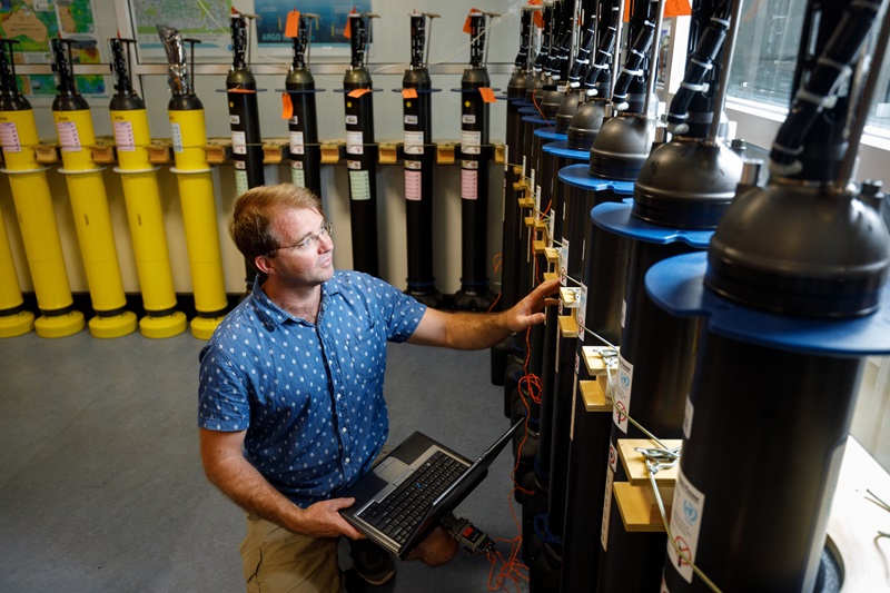 CSIRO researcher in a lab of Argo floats