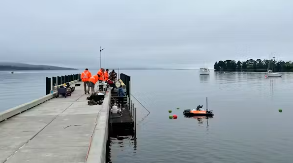 Researchers conduct an ocean alkalinity enhancement field test.