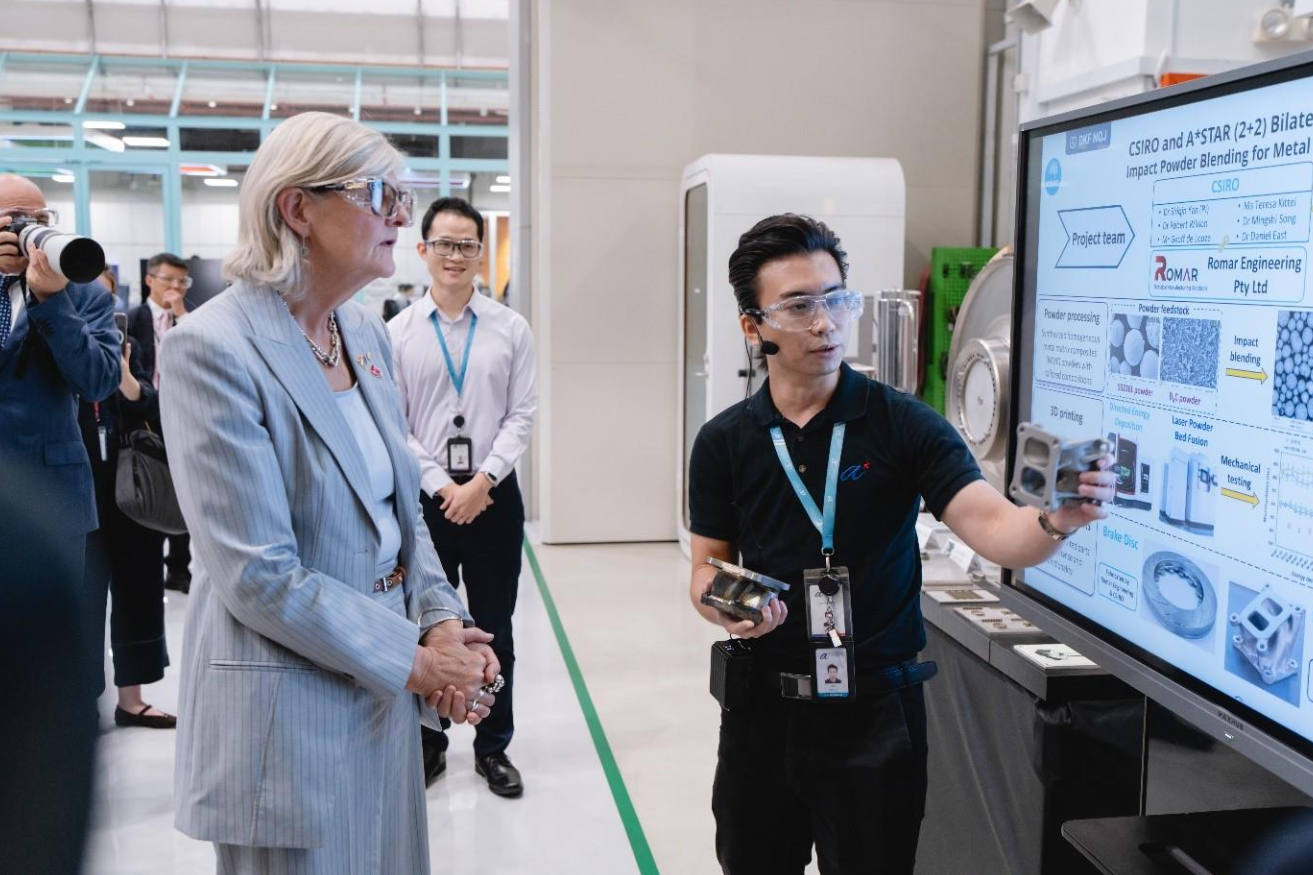 Australia Governor General looking at project 3d printed sample.