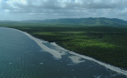 aerial view of coastline with river mouth