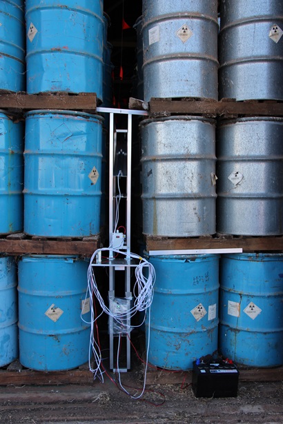 stacked galvanised and painted drums