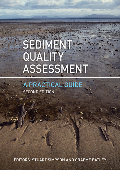 Book cover showing sediment on the edge of a muddy lake and showing the title Sediment Quality Assessment - A Practical Guide. 