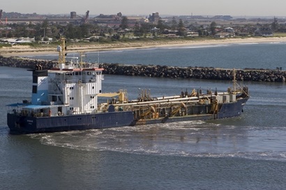 Dredge ship working in a waterway. 