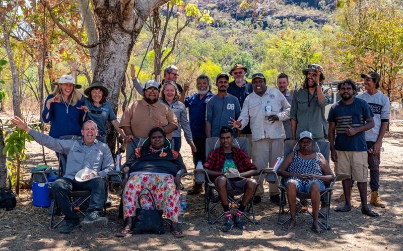 The team of researchers and co-authors at Jarrangbarnmi, smiling and waving at the camera.