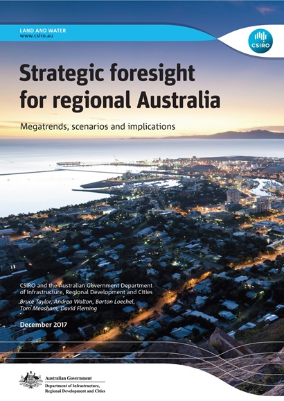 Report cover showing aerial view of a large coastal town in the foreground, ocean in the background with the title "Strategic foresight for regional Australia  Megatrends, scenarios and implications report" and CSIRO logo. 