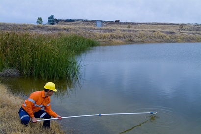 Worker monitoring mine tailings 