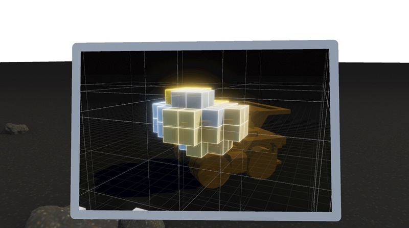 A stack of cubic blocks superimposed above a cartoon of a yellow mining truck viewed on the screen of a digital device