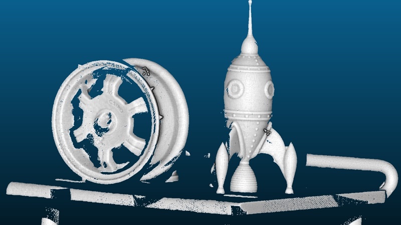 car wheel rim and rocket shaped object
