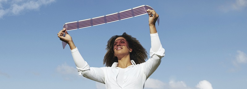 Oman holding up new printable solar cells that are flexible, light weight and are so thin that they can cover most surfaces.
