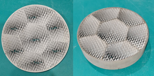 Two images side by side of a spherical, silver plate with honeycomb pattern and rough surface. On an aqua background. 