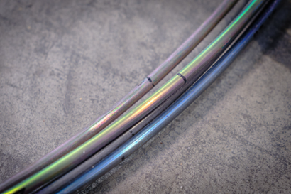 Four pieces of titanium wire with beautiful iridescent colour - blues and greens and golds. 