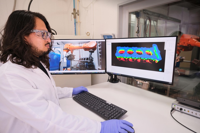 A scientist at a computer