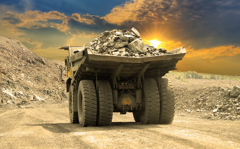 MIning truck hauling load of rocks