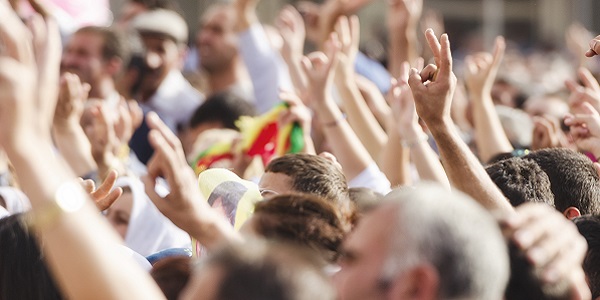 Crowd with raised hands in the air