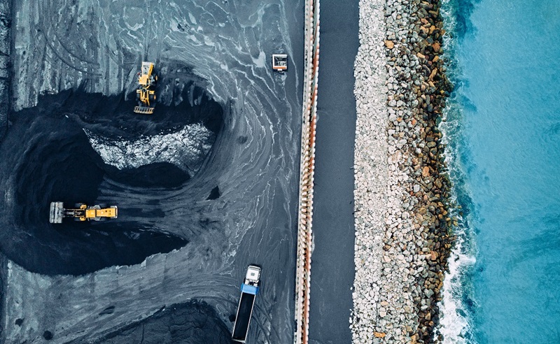 Open cut coal mine near shoreline