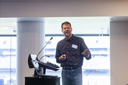 Man at lectern