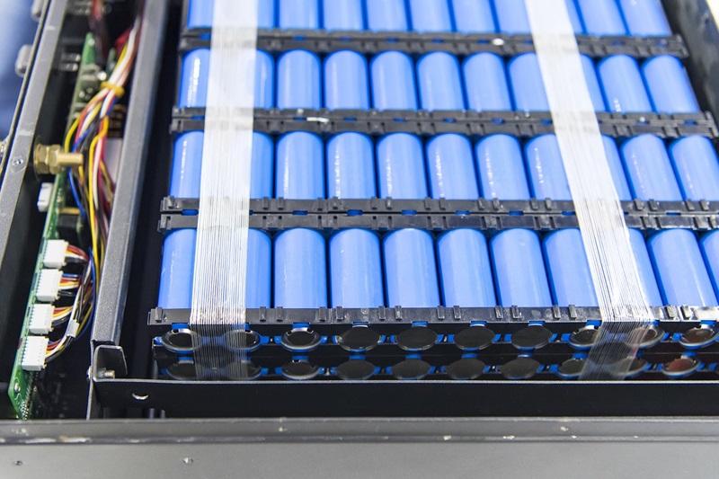 Automated conveyor with blue rollers