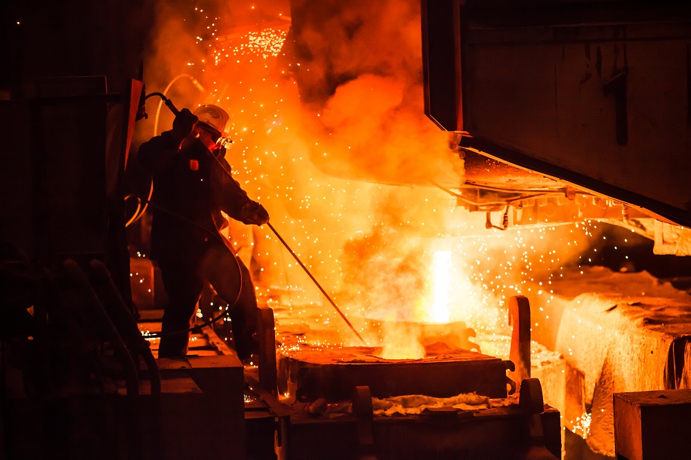 Worker at a blast furnance