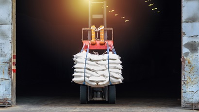 Forklift carrying bags of sugar