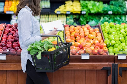Person shopping for fruit